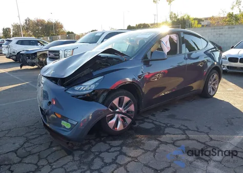 2023 Tesla Model Y Awd/Long Range Dual Motor All-Wheel Drive z USA, uszkodzony, nr VIN 7SAYGDEE1PA061587